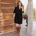 Women’s black velvet shirt dress, a long-sleeved, button-down mini dress with a collar and pockets