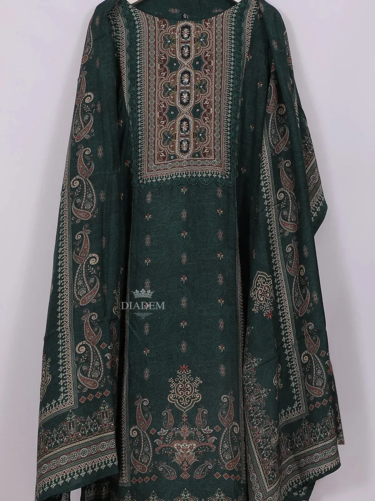 Dark Green Cotton Straight Cut Salwar Suit Adorned with Paisley Prints, paired with Dupatta